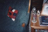 Mike's place at the house, empty sobee bottle...